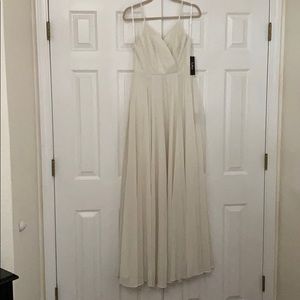 NWT; Simply glamorous gown, without compromising your budget or style.